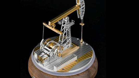 Close-up view of Mech artisans Scale Model Of Pumpjack Oil Pump in black background